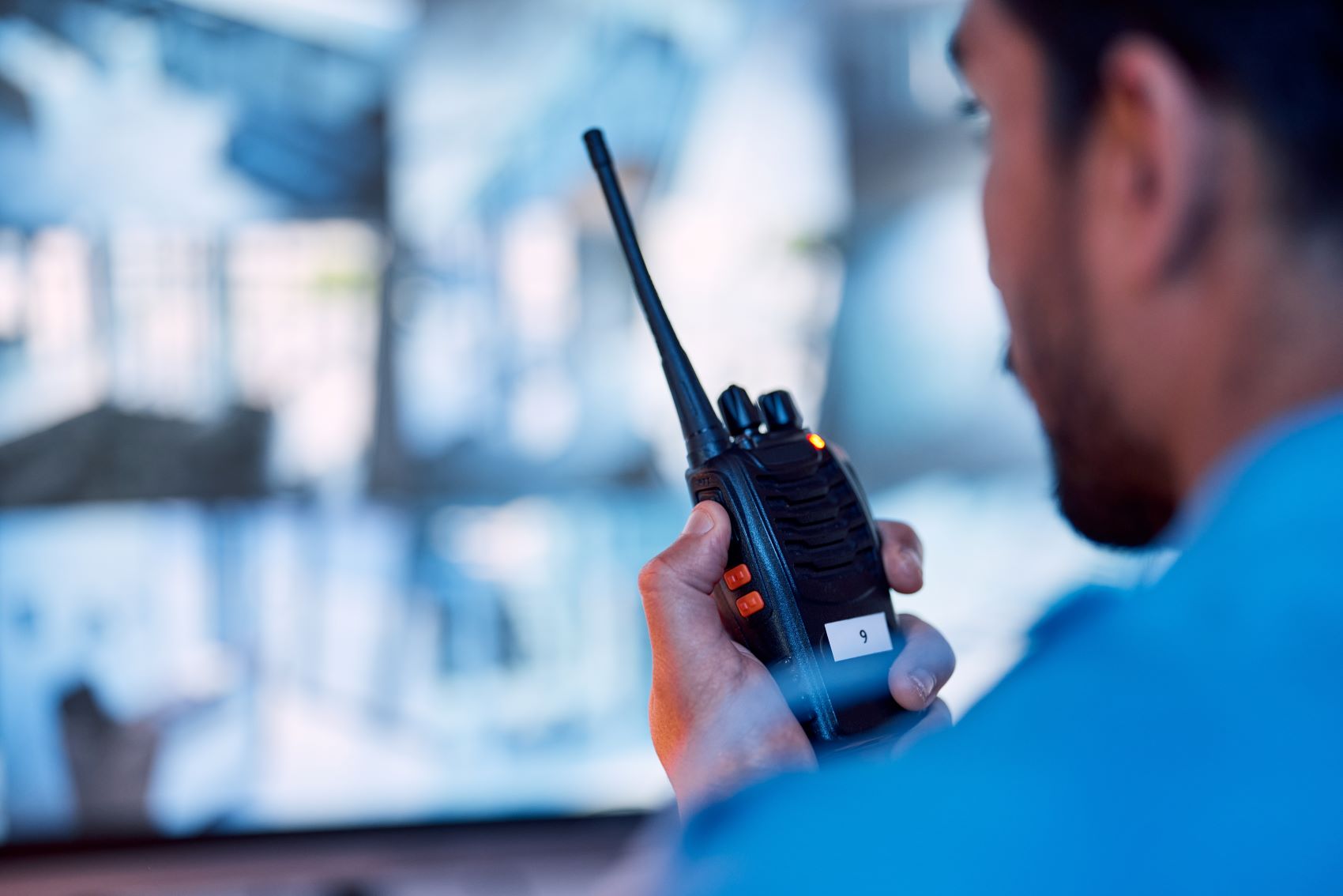 person using two-way radio