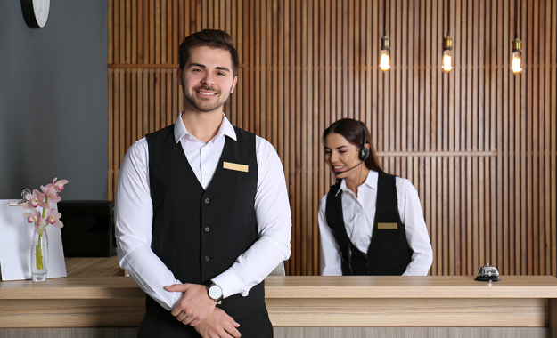 workers at hotel front desk