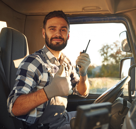 man in a van with a radio