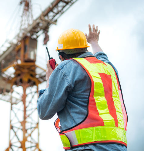 man looking up on a radio