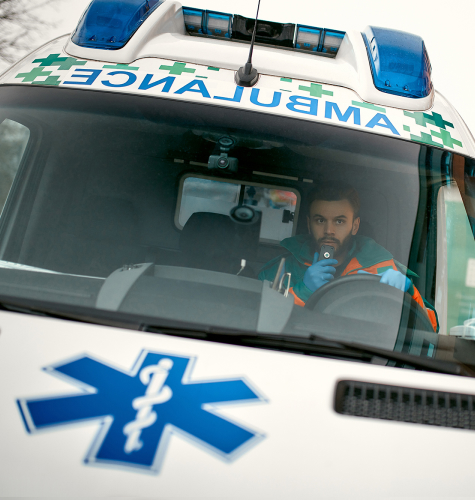 man on radio in ambulance