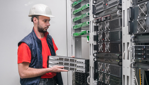 man checking equipment